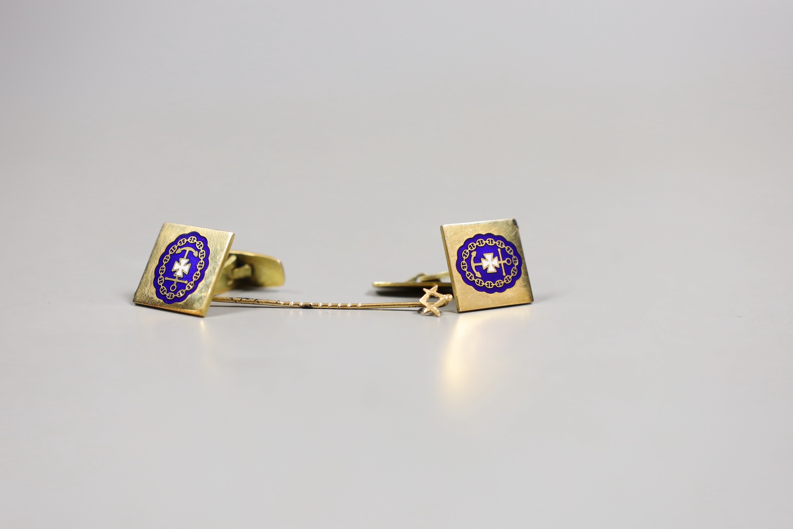 A pair of 585 and enamelled cufflinks, gross 13.8 grams and a yellow metal masonic stick pin.